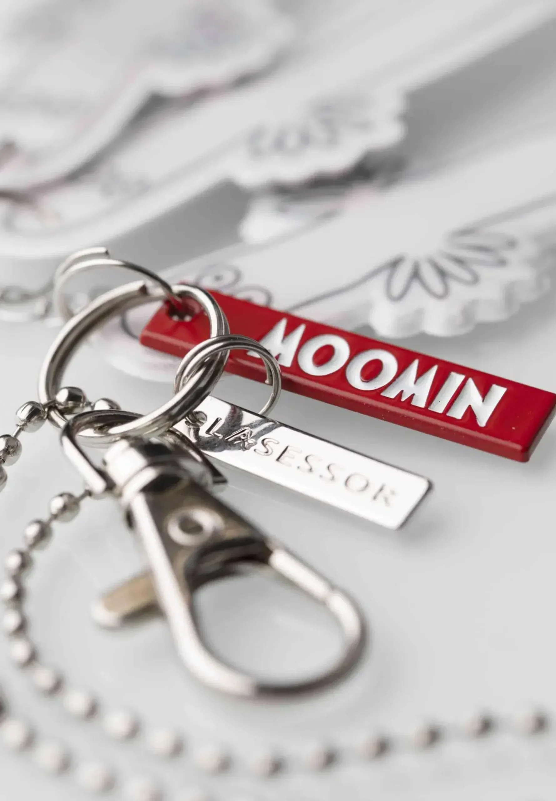 Lasessor Heijastimet<L'asessor Hattivatit heijastin